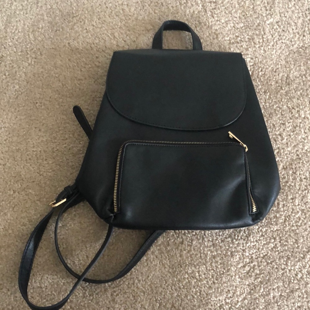 black faux leather backpack